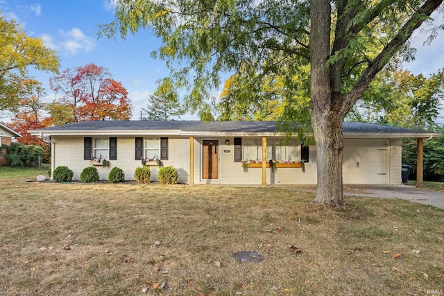 single story home featuring a carport, a front yard, and covered porch