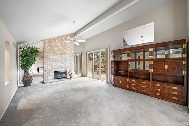 carpeted living room featuring beamed ceiling, ceiling fan, a brick fireplace, and high vaulted ceiling