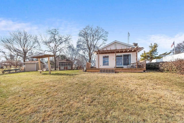 view of yard featuring a deck and a storage shed