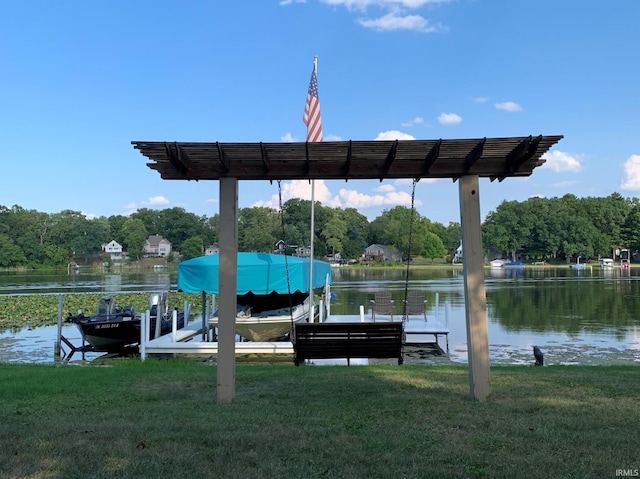 dock area featuring a water view and a lawn