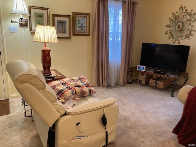 living room with light colored carpet