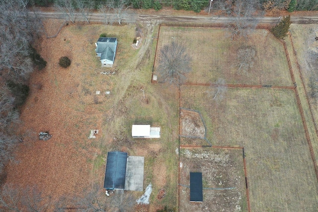 birds eye view of property featuring a rural view