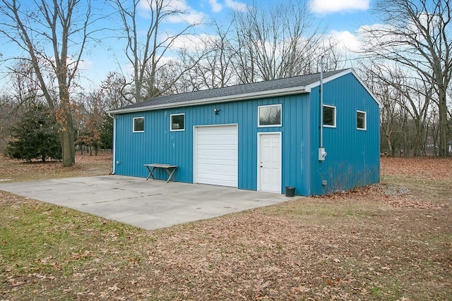 view of outbuilding featuring a garage