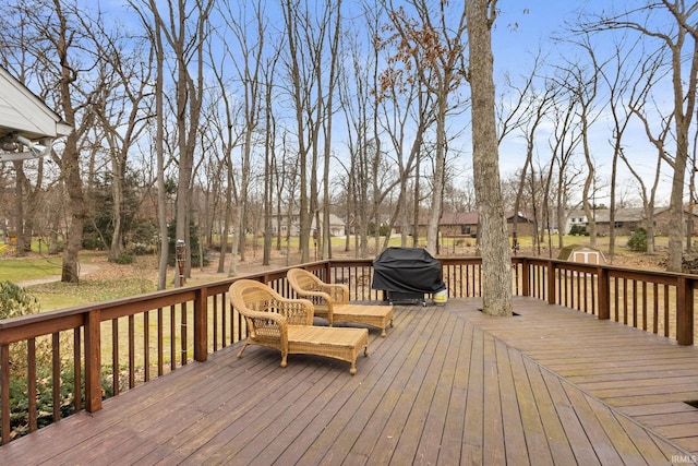 wooden deck featuring grilling area