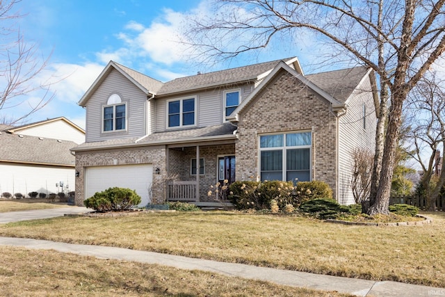 view of front of house featuring a garage, a front yard, and a porch