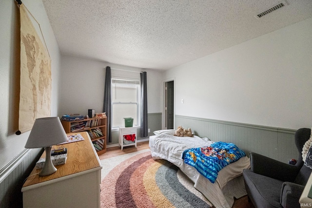 bedroom with a textured ceiling