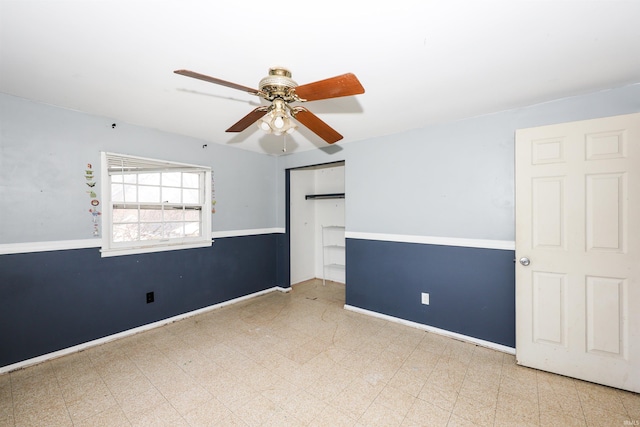 spare room with ceiling fan