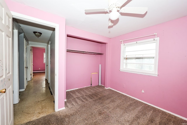 unfurnished bedroom featuring ceiling fan, carpet flooring, and a closet