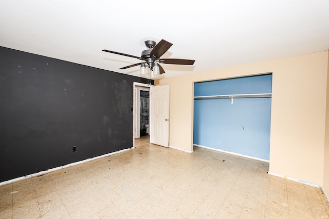 unfurnished bedroom with a closet and ceiling fan