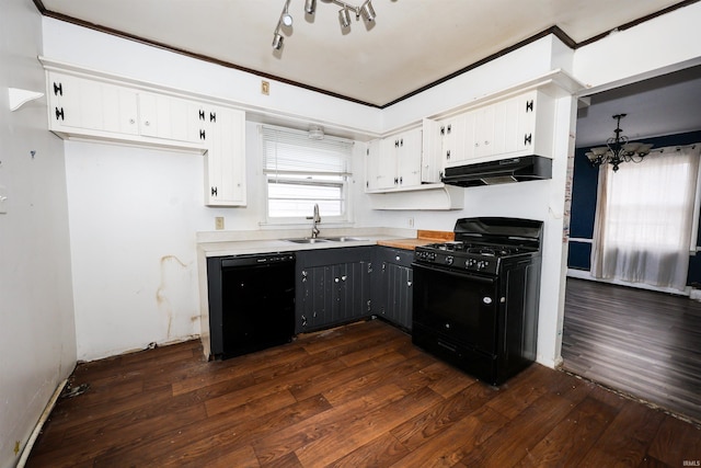 kitchen with white cabinetry, sink, a notable chandelier, and black appliances