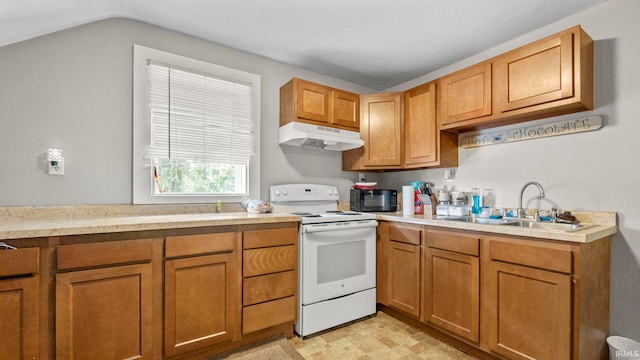 kitchen with electric stove and sink