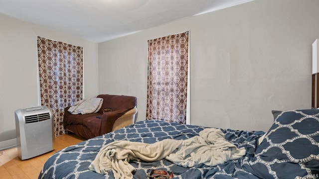 bedroom featuring hardwood / wood-style flooring