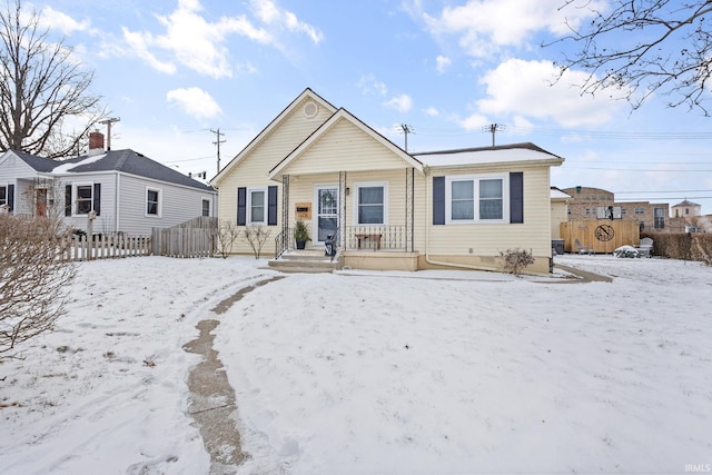 view of front of home with fence