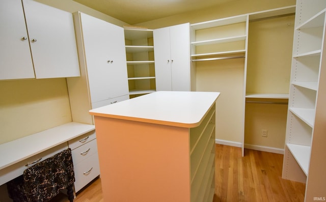 walk in closet featuring light wood-type flooring