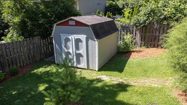 view of outdoor structure with a lawn