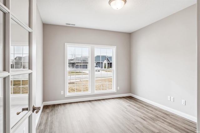 empty room featuring light hardwood / wood-style flooring