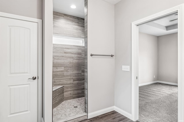 bathroom with tiled shower