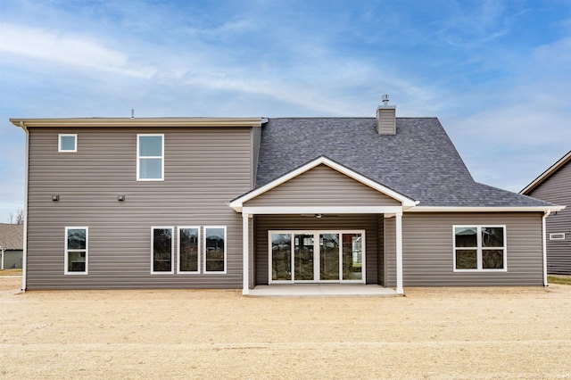 back of property featuring a patio area