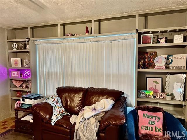 interior space featuring a textured ceiling