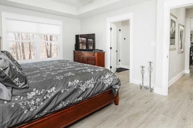 bedroom with light wood-type flooring