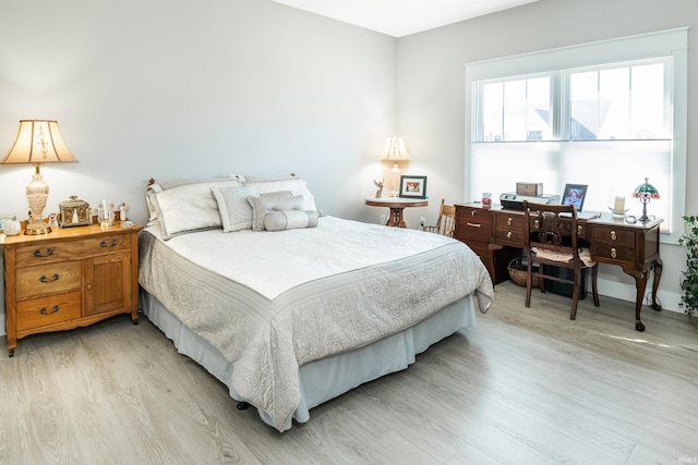 bedroom featuring light hardwood / wood-style flooring