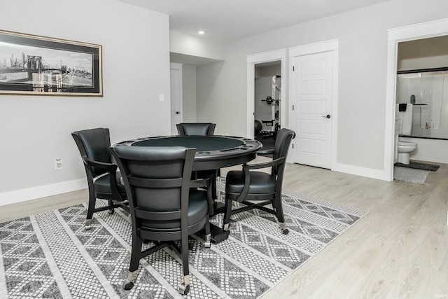 dining space featuring light hardwood / wood-style flooring