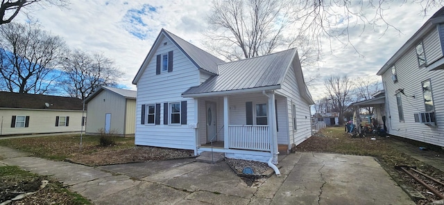 519 W 5th St, Mount Carmel, IL 62863 - view of front of house with cooling unit and a porch