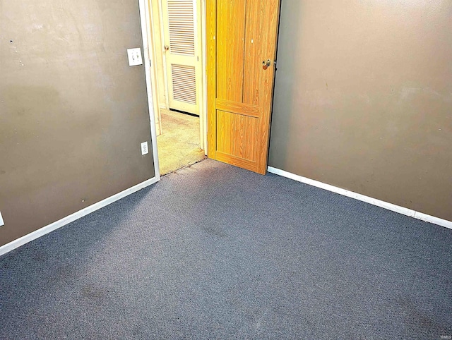 spare room with carpet