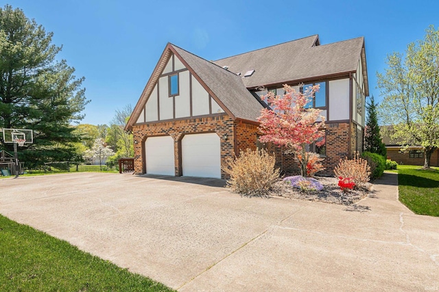 view of side of home featuring a garage