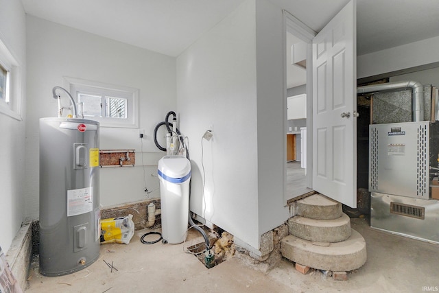 utility room with water heater