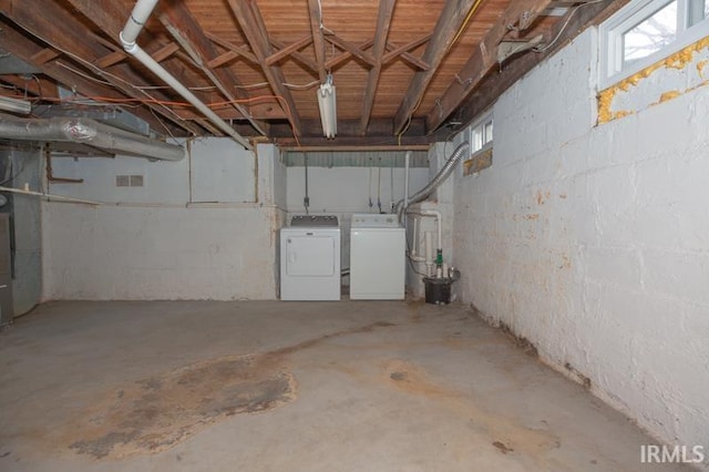 basement with separate washer and dryer