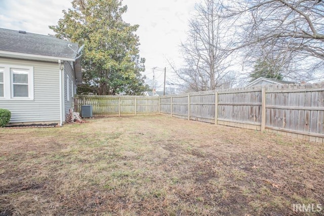 view of yard with central AC unit