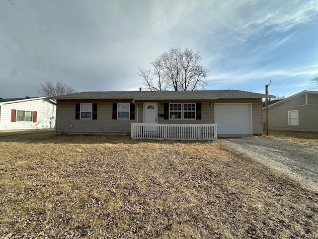 single story home with a garage