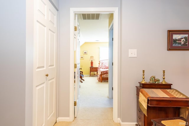 corridor with light carpet