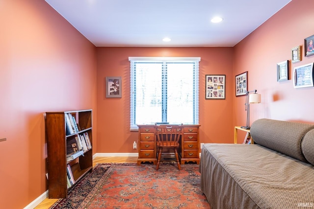 bedroom featuring wood-type flooring