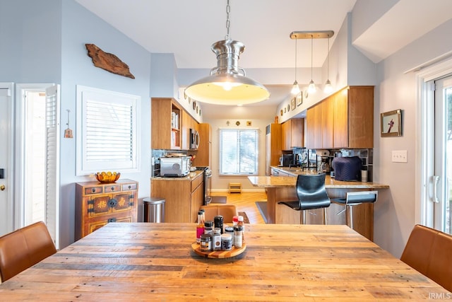 dining room with light wood-type flooring