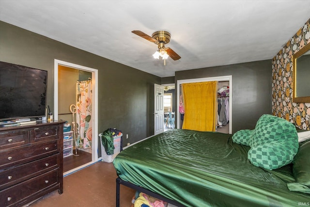 bedroom featuring ceiling fan and a closet