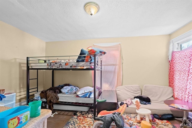 bedroom featuring a textured ceiling