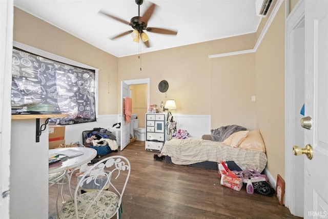 bedroom with crown molding, dark hardwood / wood-style floors, and ceiling fan