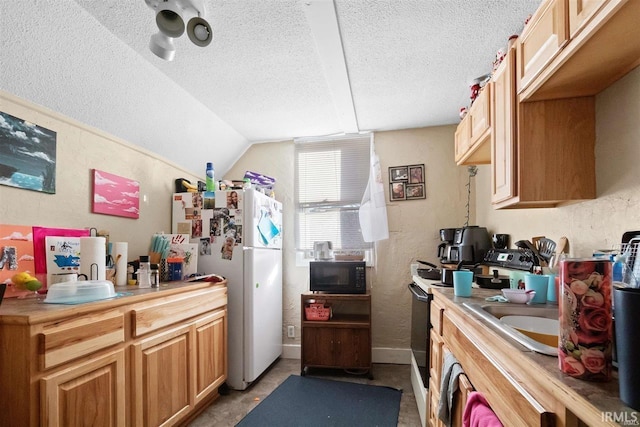 kitchen featuring lofted ceiling, wooden counters, a textured ceiling, range with electric stovetop, and white refrigerator