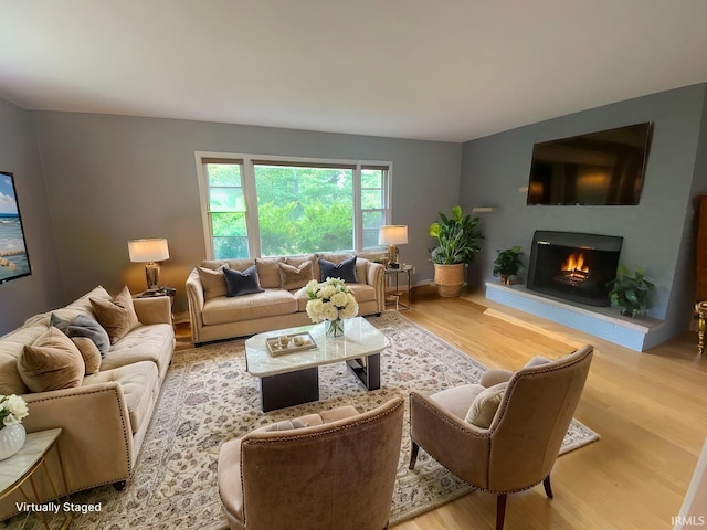 living room with light hardwood / wood-style floors