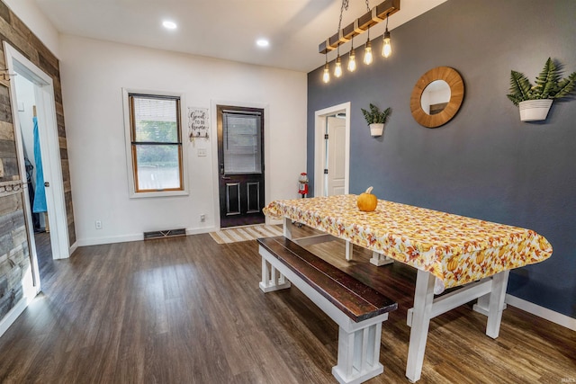 dining area with dark wood-type flooring