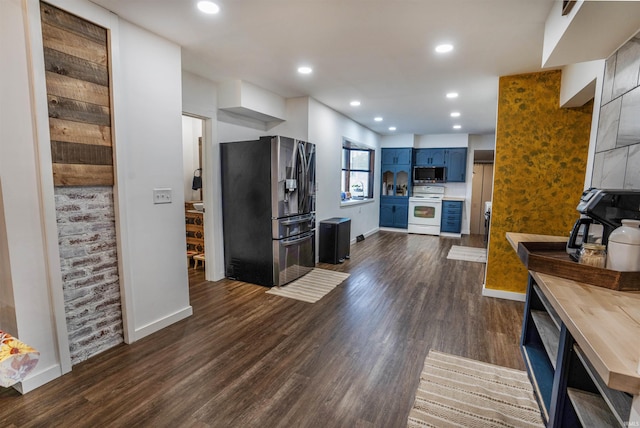 kitchen with blue cabinets, stainless steel fridge with ice dispenser, dark hardwood / wood-style floors, and electric stove