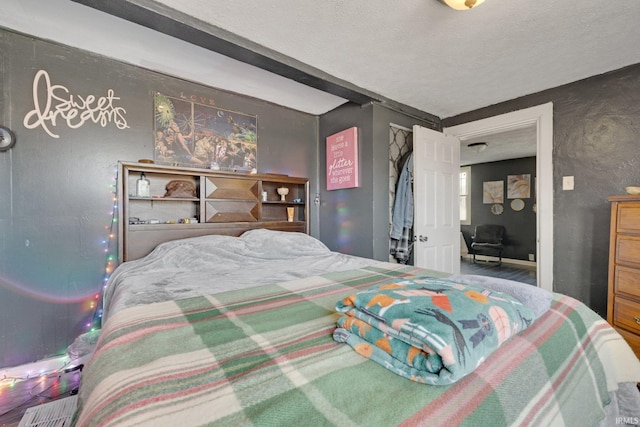 bedroom featuring a textured ceiling