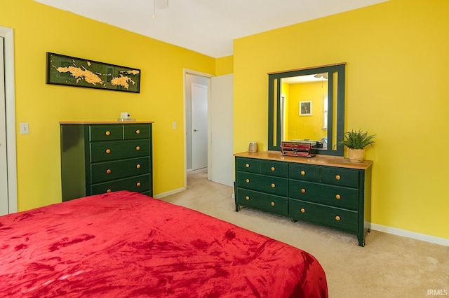 bedroom with light carpet