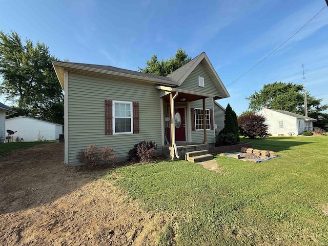 1705 E Main St, Petersburg, IN 47567 - view of front of house featuring a front yard