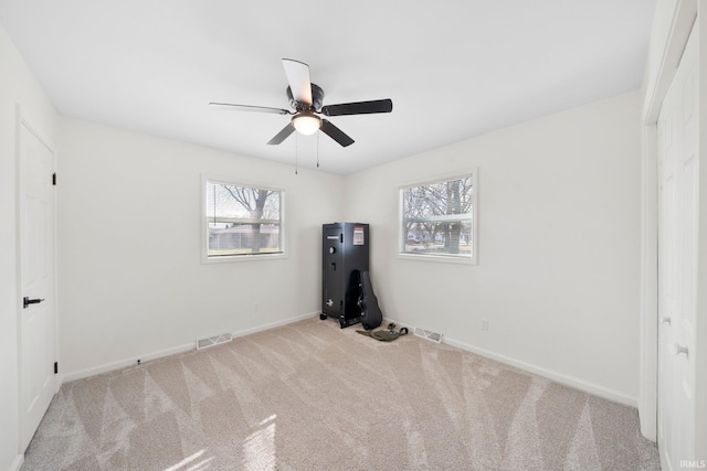 interior space featuring ceiling fan