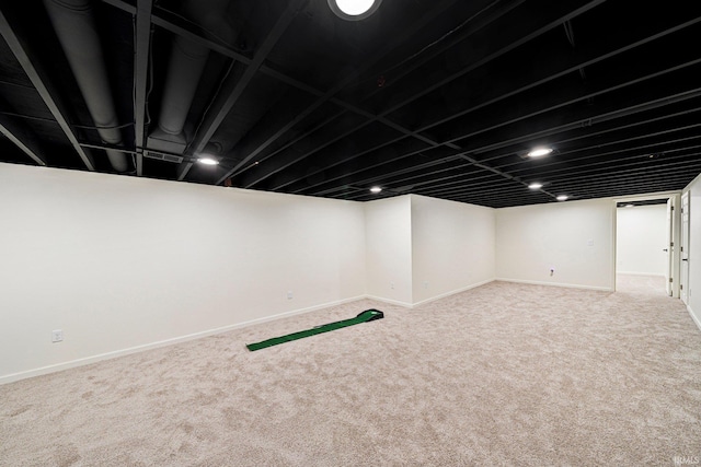 basement with carpet flooring