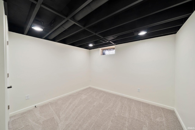 basement with light carpet