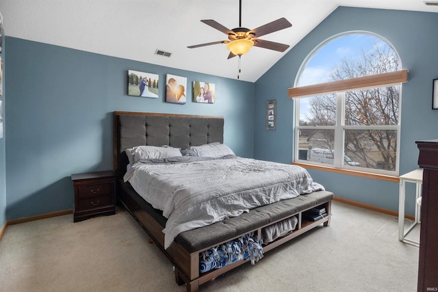 carpeted bedroom with lofted ceiling and ceiling fan